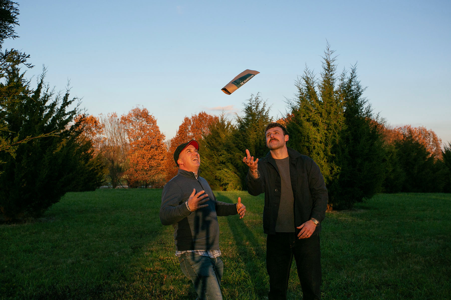 co owners Matt and Austin with a bag of Goldenrod Coffee